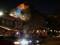 Brian Tillett paints into the night high above Union Street in downtown New Bedford as he works on a mural on the upper section of Play Arcade titled, The Final Piece.  The mural consists of lone Tetris piece representing New Bedford's play in the artistic growth in Massachusetts while the cosmic background the vast creative options for the local art community.