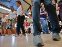 Attendees dance during the Victor and the Senior Stepper's reunion held at the Buttonwood Senior Center in New Bedford.