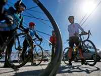 Cyclists decide on what route to ride as they wait for the Padanaram bridge to open in Dartmouth. Unfortunately the bridge never opened after encountering a mechanical issue.