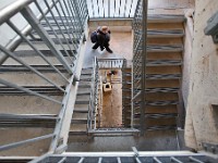 A man walks down the stairs of the Zeiterion Theater public parking garage in New Bedford.