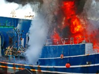 Fairhaven firefighters battle a fire which broke out inside the fishing boat Carrabassett which was undergoing repairs while docked at the bottom of Washington Street in Fairhaven.