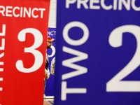 A voter waits to receive his ballot at one of the various precinct check-in tables at the Fairhaven Recreation Center polling staion on Election Day, Nov. 5, 2024.