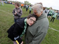 Wanda Pittsley kisses her daughter Amanda Pittsley after she kicked a soccer ball during the Special Olympics held at the DYSA field in Dartmouth.