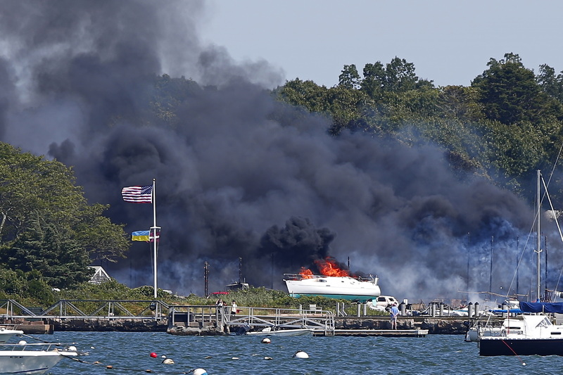 A multi-alarm fire rips through the Mattapoisett Boat Yard at Ned's Point Road in Mattapoisett, MA.  PHOTO PETER PEREIRA