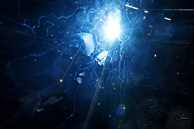 Jay Medeiros sends sparks flying as he welds together a boat rack at the Brownell Boat Stands manufacturing plant in the Mattapoisett, MA industrial park. PHOTO PETER PEREIRA