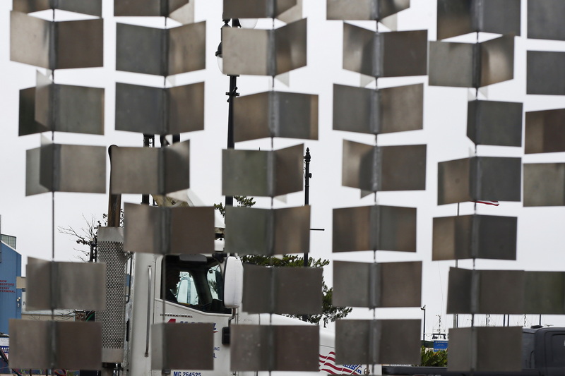 A truck driver makes his way up Route 18 in downtown New Bedford, MA past a 