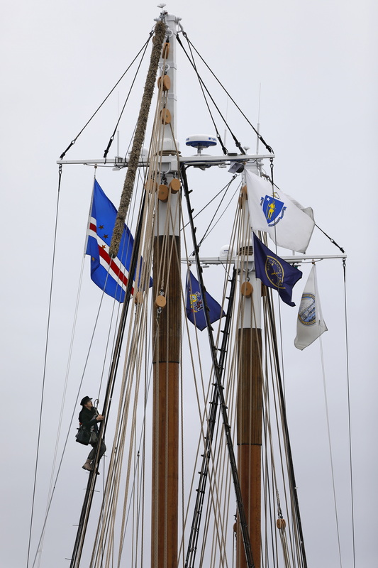 Harper MacDonald finds himself high up making repairs to the rigging of the schooner Ernestina-Morrissey docked in New Bedford, MA. PHOTO PETER PEREIRA