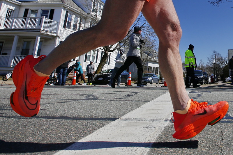 Runners make their way up Rockdale Avnue during the 2023 New Bedford Half-Marathon.  PHOTO PETER PEREIRA