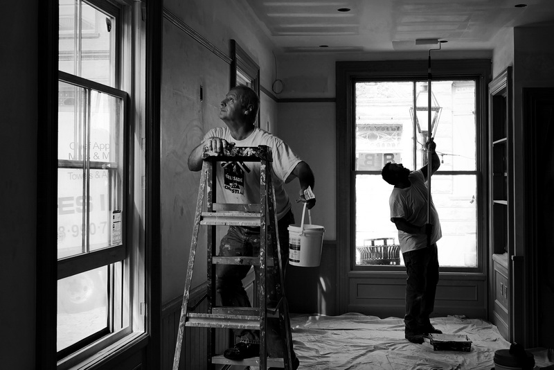 Brian Amaral and Mark Oliveira of David Monteiro Painting put a fresh coat of paint on the soon to open addition of Tia Maria's European Cafe in downtown New Bedford, MA. PHOTO PETER PEREIRA