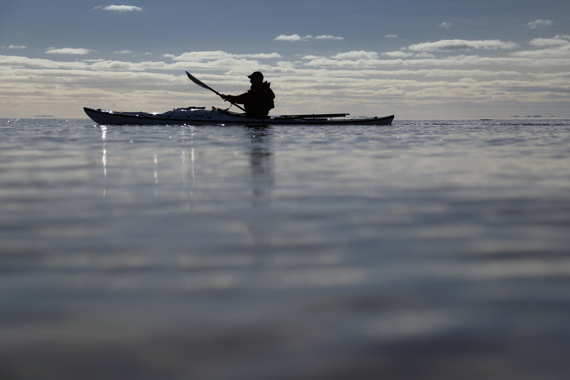 Brendan Rogers makes his way around Ned's Point in Mattapoisett, MA for a morning paddle.  PHOTO PETER PEREIRA