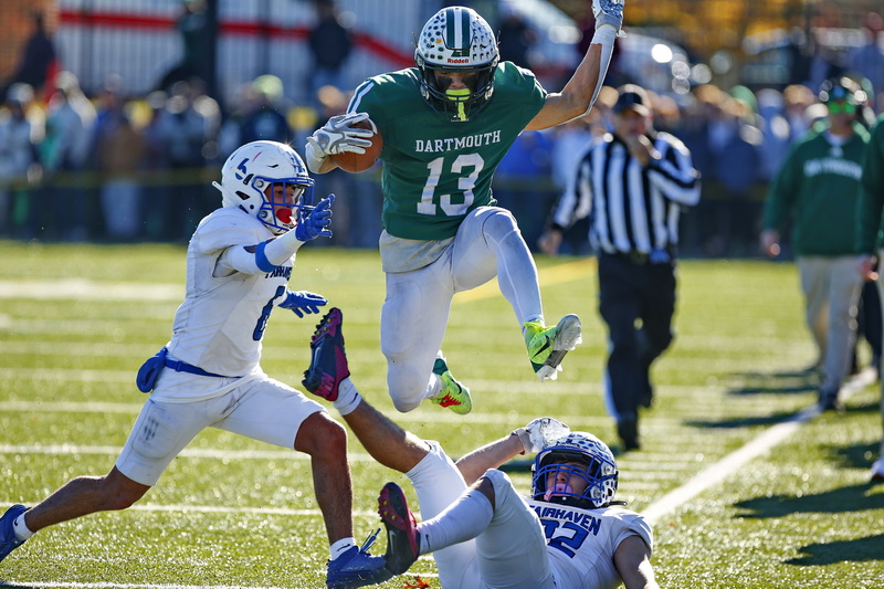 Dartmouth wide receiver Marcus Andrews jumps over the Fairhaven defense. Fairhaven beat Dartmouth 24-21 with a late field goat at Dartmouth. PHOTO PETER PEREIRA