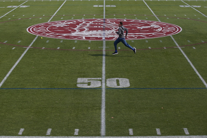 Matt Bejtlich takes advantage of the great weather to do some sprints at the Tabor Academy field in Marion, MA.  PHOTO PETER PEREIRA