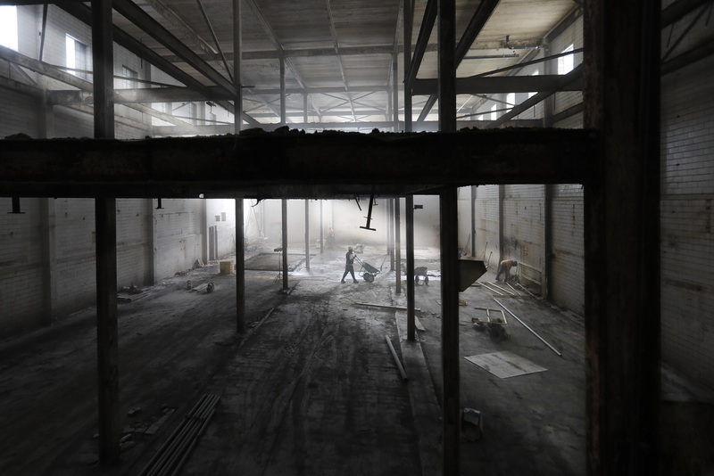 Crews continue the extensive work in clearing out the former space which housed the bread ovens at the former Sunbeam Bread plant on Coffin Avenue in New Bedford, MA. PHOTO PETER PEREIRA