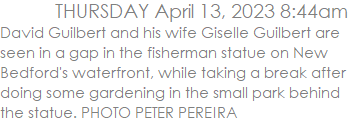 David Guilbert and his wife Giselle Guilbert are seen in a gap in the fisherman statue on New Bedford's waterfront, while taking a break after doing some gardening in the small park behind the statue. PHOTO PETER PEREIRA