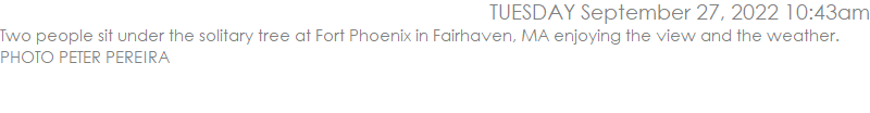 Two people sit under the solitary tree at Fort Phoenix in Fairhaven, MA enjoying the view and the weather. PHOTO PETER PEREIRA