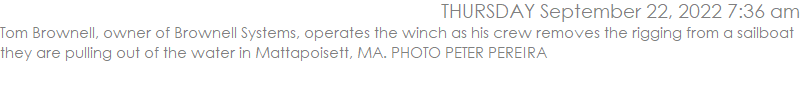 Tom Brownell, owner of Brownell Systems, operates the winch as his crew removes the rigging from a sailboat they are pulling out of the water in Mattapoisett, MA. PHOTO PETER PEREIRA