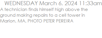 A technician finds himself high above the ground making repairs to a cell tower in Marion, MA. PHOTO PETER PEREIRA